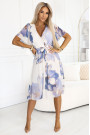  602-1 Romantic dress with envelope neckline and airy sleeves - blue flowers on a white background 